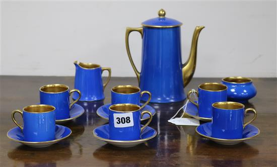 A Crown Ducal Royal blue and gilt coffee set